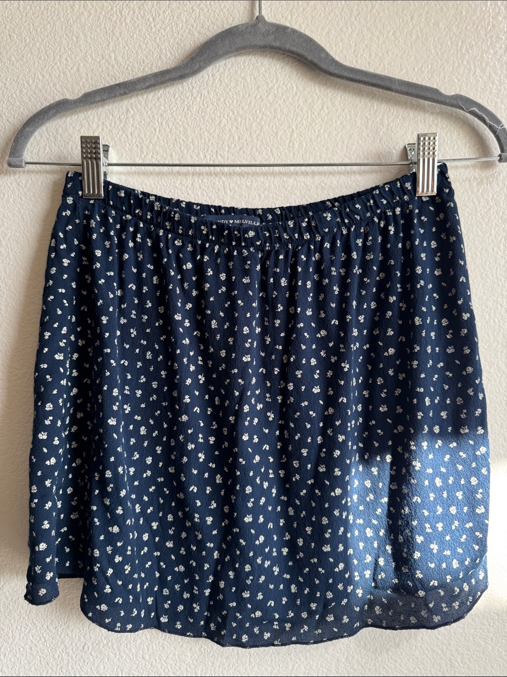 Brandy Melville Navy Mini Skirt with White Floral Print